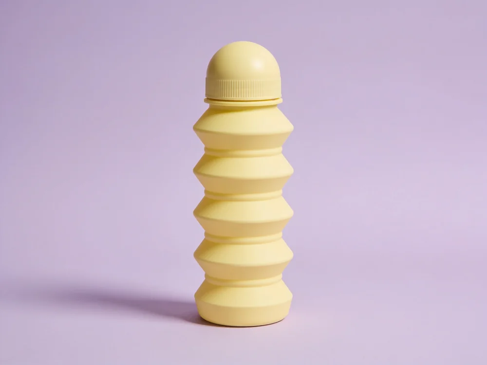 Collapsible travel bottle — Flexible silicone body; polypropylene screw cap